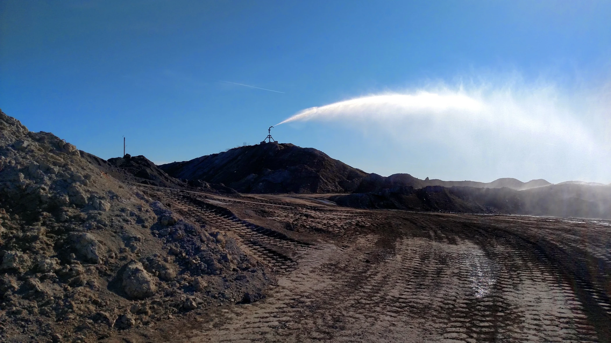 Big Gun® Sprinkler controlling dust at a quarry.