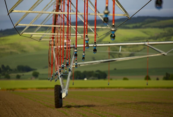 Choose the right sprinkler, spacing, and pressure for the crop, climate, and soils.